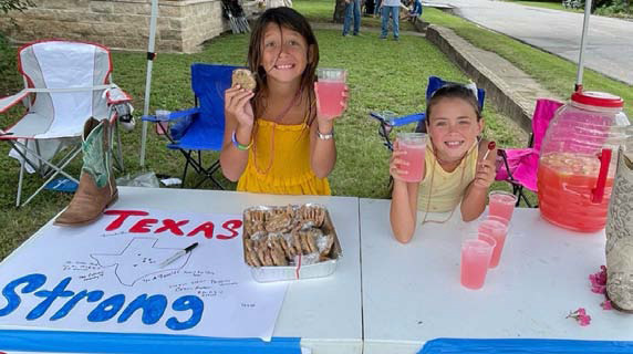 Sisters raise funds to help flood-stricken family